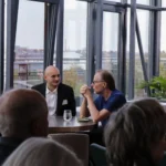 Client Executive, David Crillesen, taler med investor til kvartalsarrangement